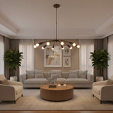 Mykonos 12 light chandelier shown in a full product view with wide curved arms, dark tapered sockets and round ceiling canopy