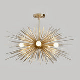 Front view of the Naples 5-light starburst chandelier featuring a radiant gold-tone metal finish, intricate sculptural rods, glowing bulbs, and an elegant ceiling suspension.