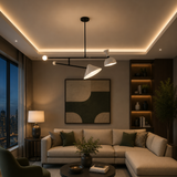 Nashville 2 light sculptural balance chandelier illuminated in a contemporary living room with white shades and a black linear frame.