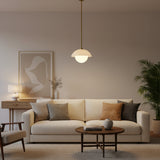 Naxos 1 light pendant close-up highlighting the curved cream dome shade, illuminated globe, and slim suspension rod.
