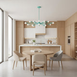Newport 18 light Mid-Century Modern Sputnik chandelier shown from an alternate front view with aqua arms and exposed globe bulbs.