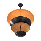 Close up of Noir Tiered Disc Chandelier highlighting bold black layered shades and sculptural profile.