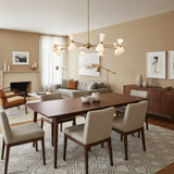 Orion Mid-Century 16-light chandelier with white cone shades and brass radial arms, front view