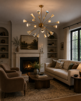 Orion 24-Light Mid-Century Sputnik Chandelier installed in a contemporary living room, showcasing its brass starburst design and handcrafted cone shades as a striking focal point.