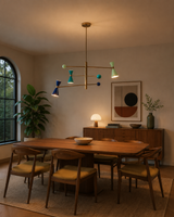 Orion 3 light colorblock Sputnik chandelier with blue turquoise and mint shades installed above a modern dining table