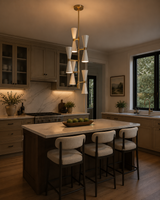 Orion Double Cone Cascade Chandelier 10 Light installed above a modern kitchen island, adding elegant Mid-Century Modern lighting with warm ambient illumination.