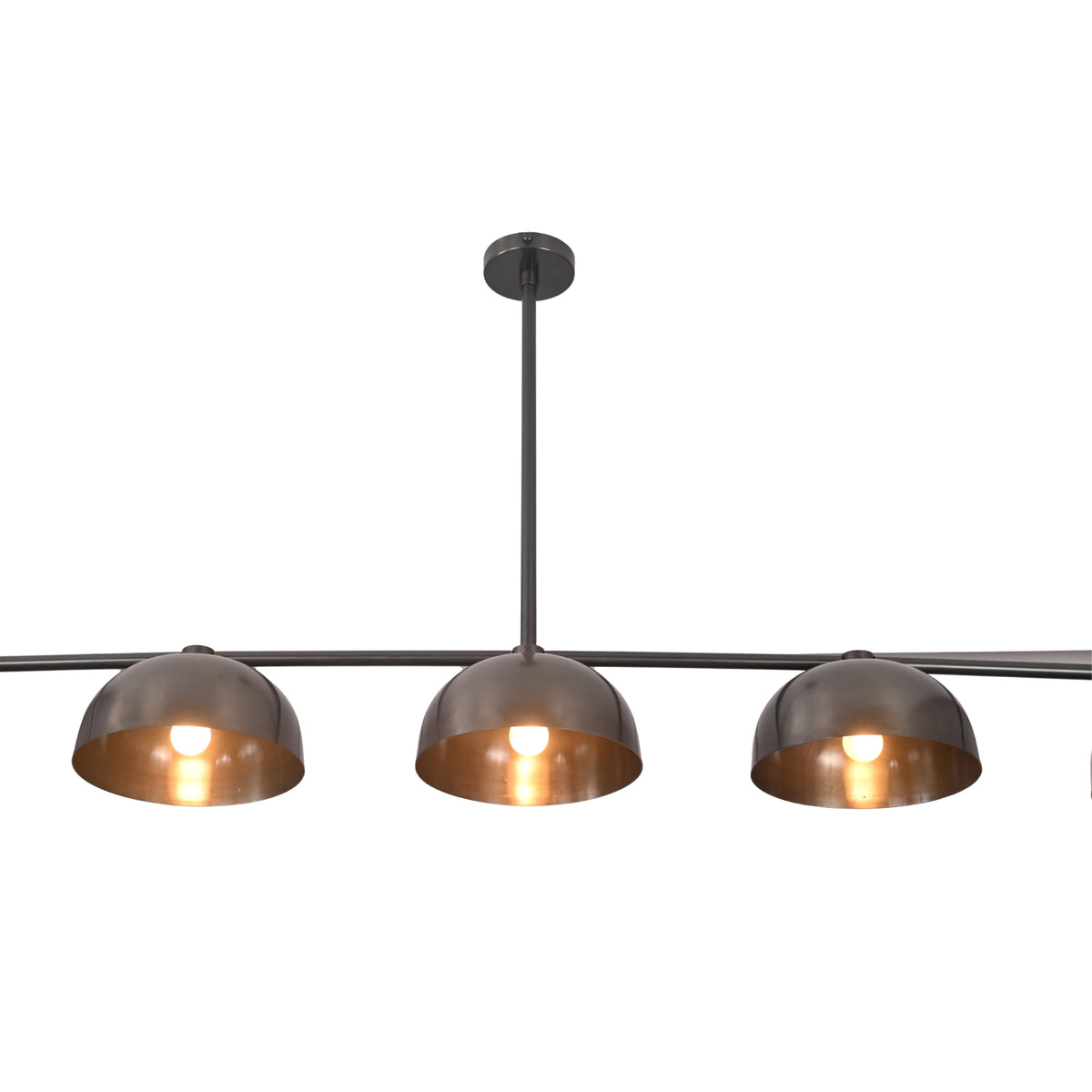 Orion 5-Light Linear Dome Chandelier in matte black with warm brass interior, front view, 72-inch modern industrial dining room ceiling light.