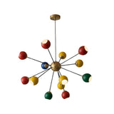 Right perspective view of the Orion multicolor Sputnik chandelier featuring colorful globe shades, brass accents, and a modern mid-century silhouette.