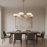 Orion 6 light opal disc chandelier with geometric brass arms, 42 inch modern ceiling light, Model 33168.
