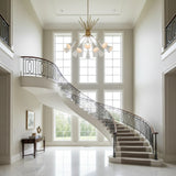 Alternate view of Orion 10 light Sputnik chandelier featuring white elongated cone shades and warm brass radial frame.