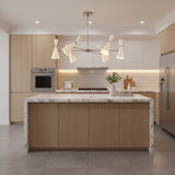 Osaka 6 light Mid-Century chandelier shown from a side angle with sculptural white cone shades and an architectural radial frame.