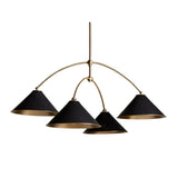 Oslo 4 light chandelier showing wide black cone shades with warm brass interiors and arched arms