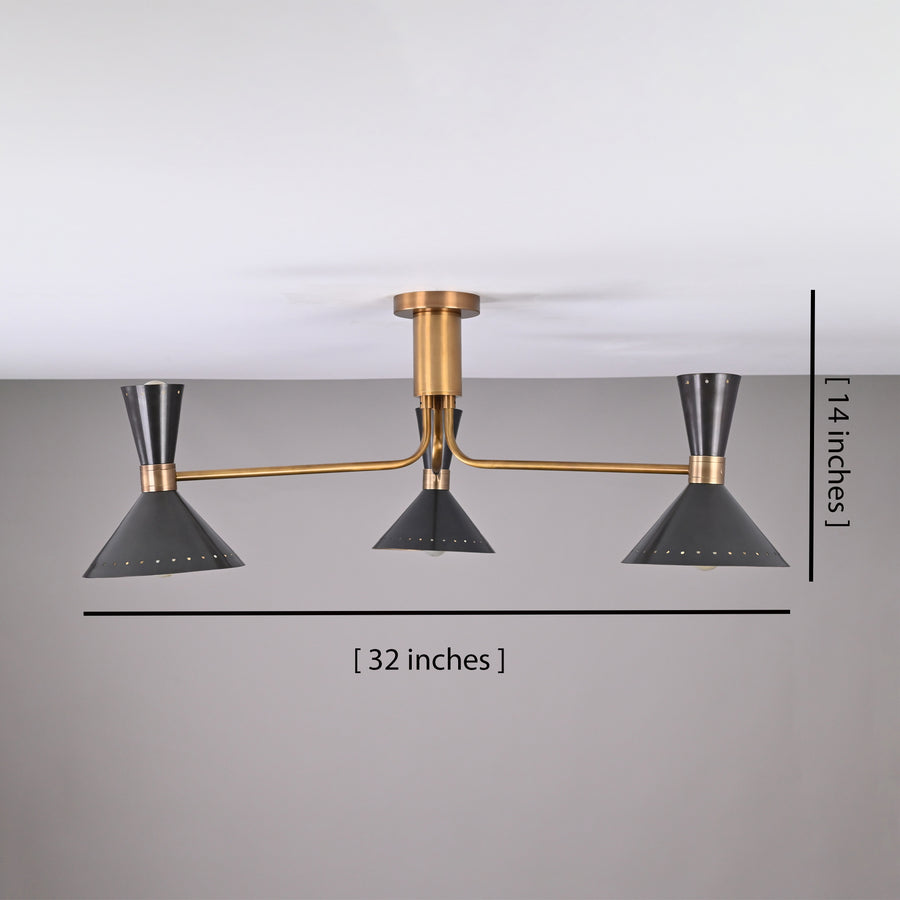 Oslo Cone Arm Chandelier installed above a round dining table in a warm modern dining room.