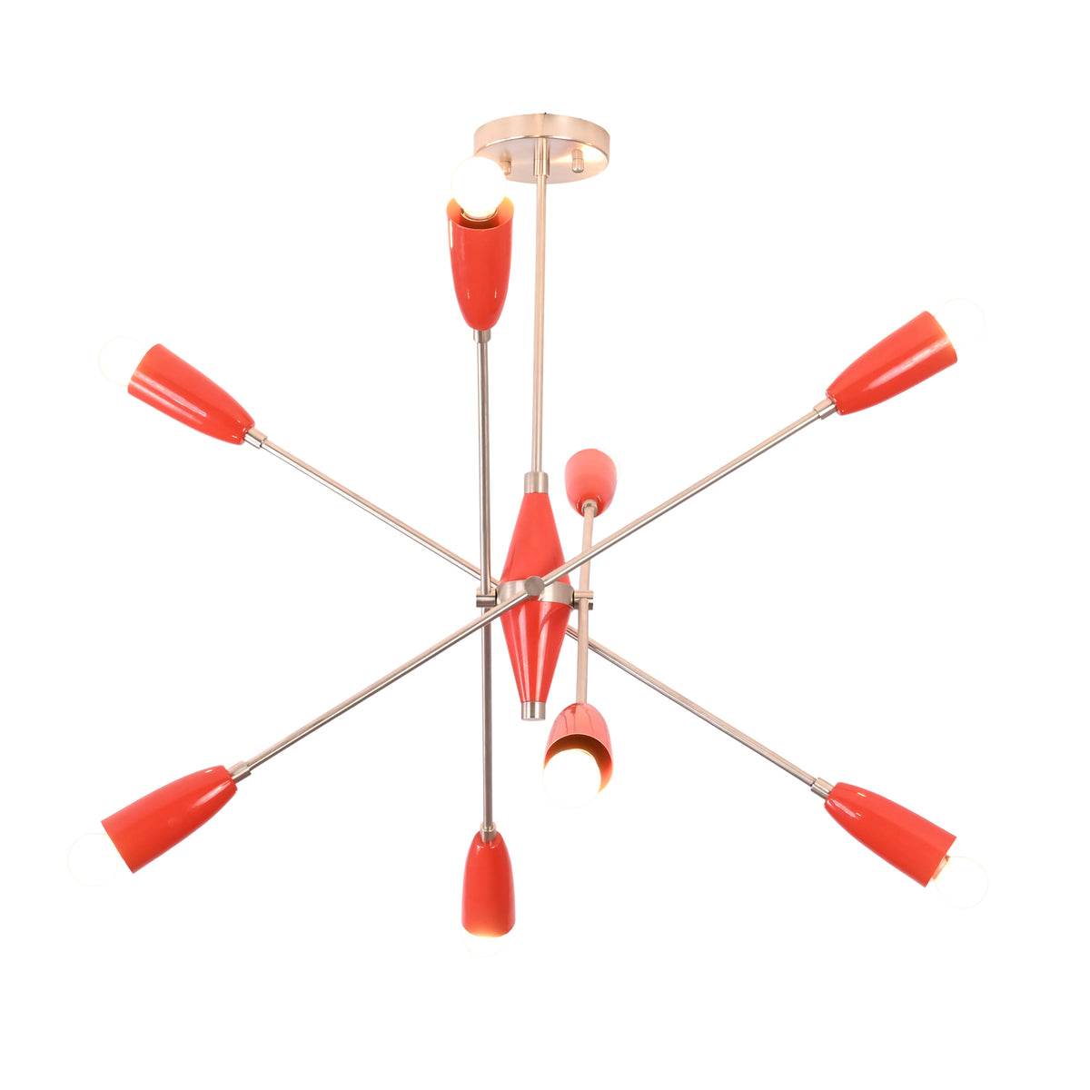 Angled illuminated view of the Oslo Modern Cone Sputnik Chandelier showcasing red tapered cone shades, brushed nickel frame, exposed bulbs, and sculptural Mid-Century Modern styling.