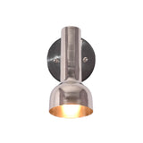 Front illuminated view of Oslo modern polished nickel accent wall light with handcrafted cylindrical shade casting warm focused downward illumination.