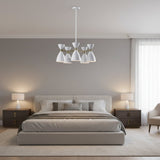 Oslo 5 light Mid-Century Modern chandelier with white double cone shades, perforated detailing and brass accents.