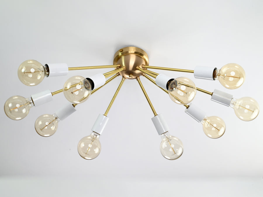 Oslo Sputnik flush mount chandelier installed in a luxury walk-in closet, providing warm ambient lighting and modern elegance.