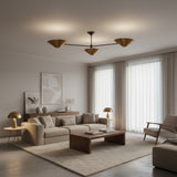 Oslo three cone chandelier with sculptural brass shades and extended arms, front view, 36 inch