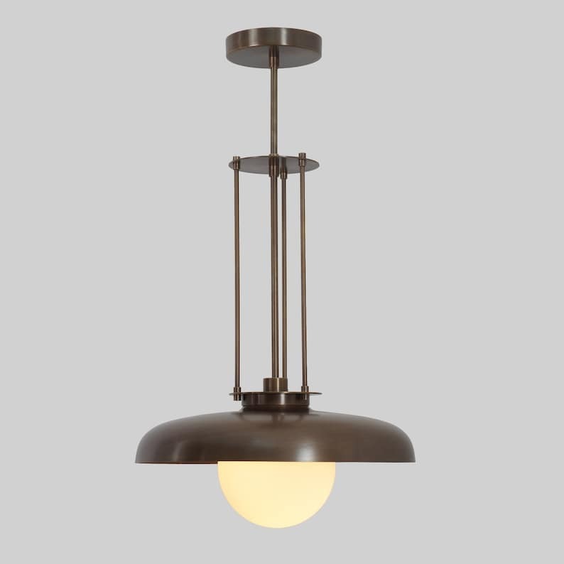 Front view of the Palermo 1-light industrial pendant featuring a 14-inch bronze-tone dome shade, glowing white globe, decorative metal suspension rods, and round ceiling canopy.