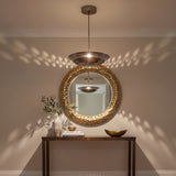 Palermo 5 light perforated metal bowl chandelier shown from a side angle with compact downrod and round canopy.