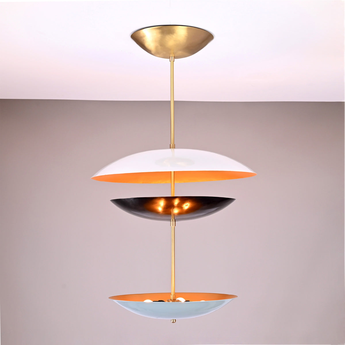 Palermo Tiered Saucer Chandelier front product view with three stacked saucer shades and slim vertical stem.