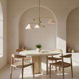 Palm Springs 3 light counterbalance chandelier shown from the front with cream cone shades, curved brass-tone arms, and spherical counterweights.
