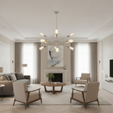 Paris 12 light polished metal Sputnik chandelier shown from the front with illuminated Edison bulbs.