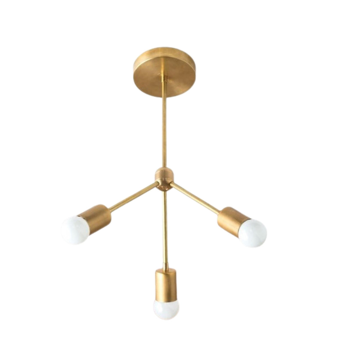Paros 3 light brass chandelier shown from an angled view with sculptural branching arms and exposed white globe bulbs.