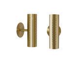 Two views of the perforated brass cylinder wall sconce shown together, highlighting side profile and front view on white background.