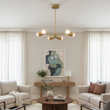 Porto 6 light Mid-Century Modern chandelier shown from the front with warm brass-tone cone holders, branching arms, and exposed bulbs.