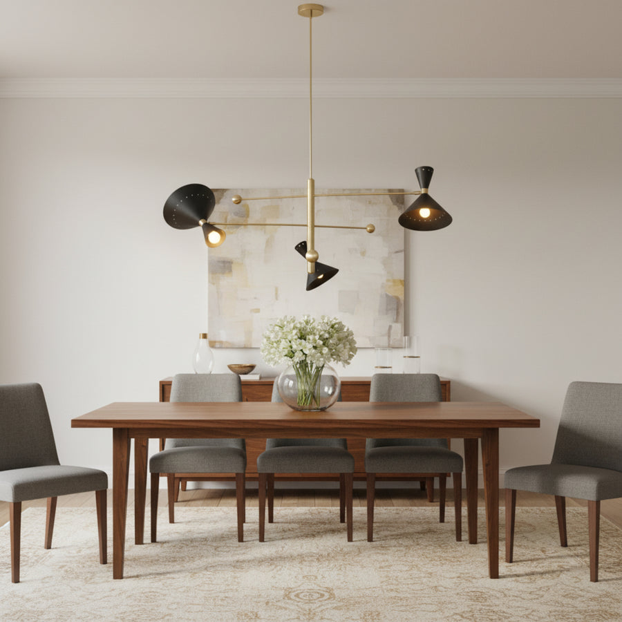 Portofino 3 light black perforated cone chandelier with brass finish shown from the front with illuminated bulbs.