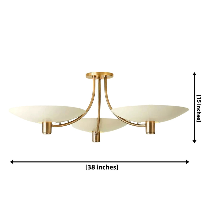 Positano 3-light Mid-Century Modern chandelier featuring ivory saucer shades and curved brass arms above a luxurious neutral bedroom with cream bedding, walnut accents, and warm ambient lighting.