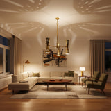 Prague 6 light aged brass perforated cone chandelier shown from an angled view with sculptural double cone shades.