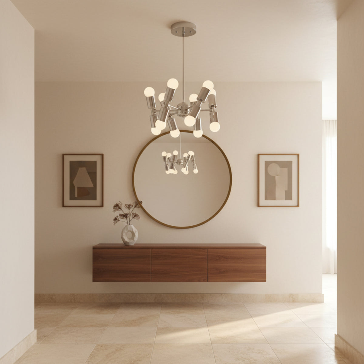 Prague 12 light sculptural chandelier shown from an angled view with polished silver-tone metalwork and multidirectional cylindrical bulb holders.