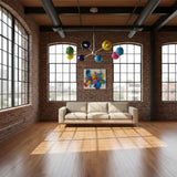 Providence 8 light multicolor Sputnik chandelier shown from the front with green, yellow, red, pink, purple, navy and blue rounded shades.