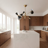 Queenstown 6 light sculptural chandelier shown from an angled view with black perforated cone shades and intersecting brass-tone arms.