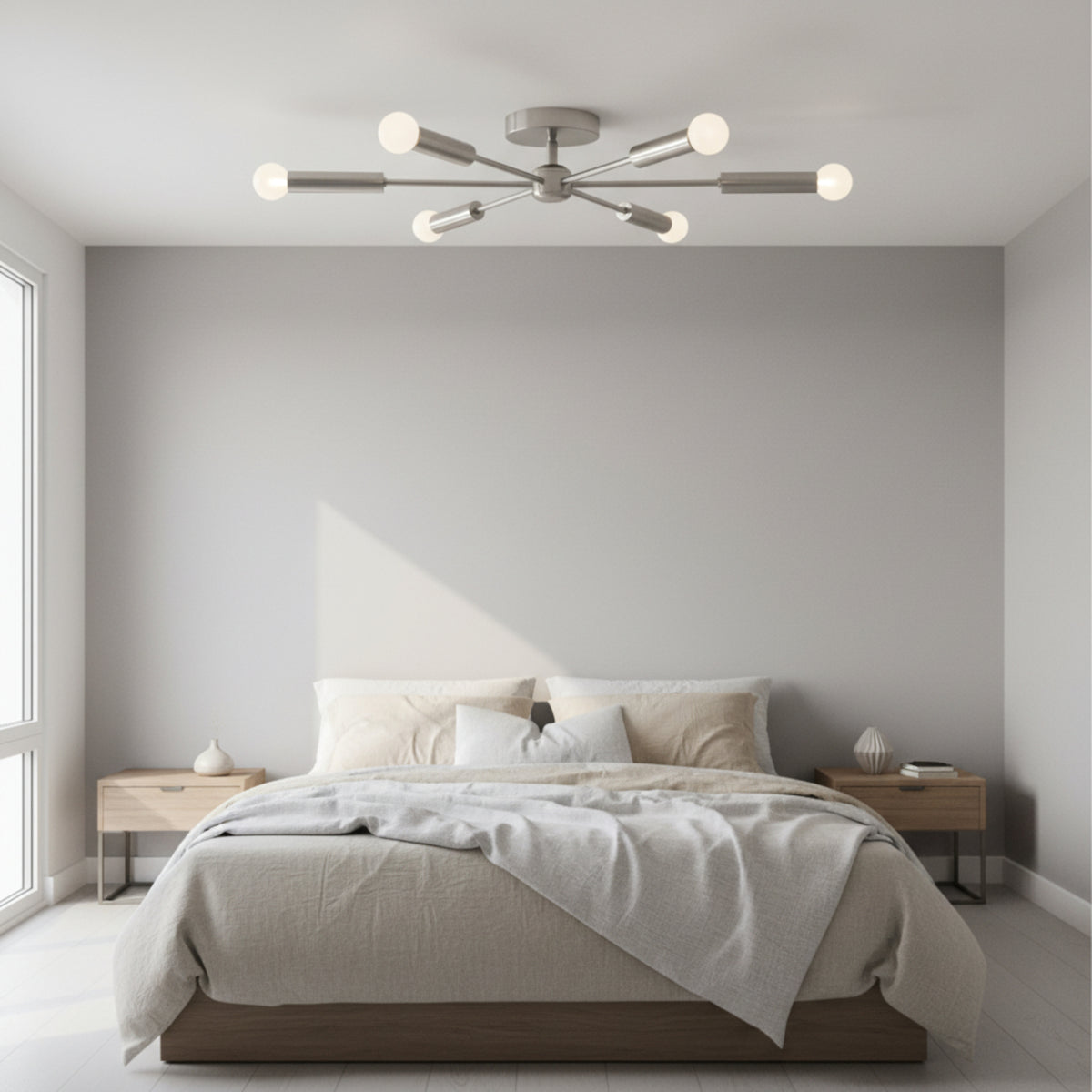 Ravenna 6 light silver-tone Sputnik flush mount chandelier shown from the front with exposed globe bulbs.