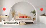 Romantic bedroom decor with pair of red disc wall sconces, modern handmade brass lighting set with ambient glow