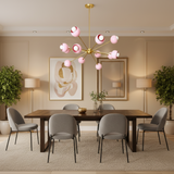Rhodes 12 light pink globe Sputnik chandelier shown in a full view with sculptural shades and brass-toned frame.