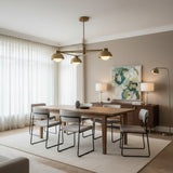 Rome 3 light brass dome arm chandelier shown from an angled view with illuminated globe bulbs and geometric arms.