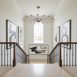 Rome 18 light sculptural Sputnik chandelier shown from the front with a silver-tone spherical hub and elongated radial arms.