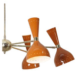 Close-up of Saint Tropez 12 light Sputnik chandelier showing glossy orange metal shades, brass-tone fittings, and Mid-Century Modern detailing.