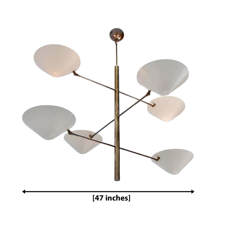 Saint Tropez 6 light sculptural chandelier with organic white leaf-shaped shades and warm brass-tone branching frame.