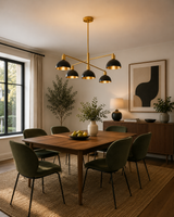 San Sebastian 5 light black and brass-tone dome chandelier displayed above a contemporary dining table.