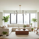 Santander 12 light brass chandelier shown from an angled view with white double-cone shades and geometric arms.