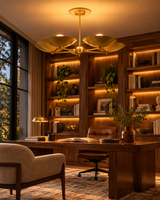 Savannah 5-light brass bowl chandelier illuminating a luxurious modern home library with walnut bookshelves, a wooden desk, leather office chair, and warm evening lighting.