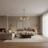 Savannah 5 light Mid-Century Modern chandelier shown from a straight front view with cream shades and an elongated bronze-tone frame.