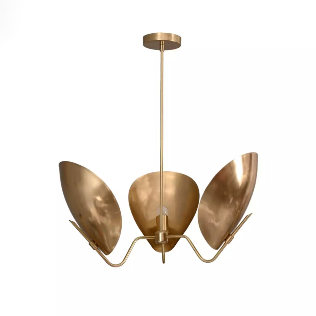 Shanghai 3 light brass-tone sculptural petal chandelier shown from an angled view with curved leaf-shaped reflectors and elegant metal arms.