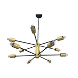 Siena 12 light Sputnik chandelier with black arms and brass-tone cylindrical holders shown unlit from an angled view.