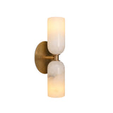 Angled illuminated view of the Sloane Double Cylinder Alabaster Wall Sconce with solid brass backplate and natural alabaster cylinder shades.